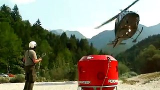 Bell 212 Twin Huey gets refilled during a big Brushfire.