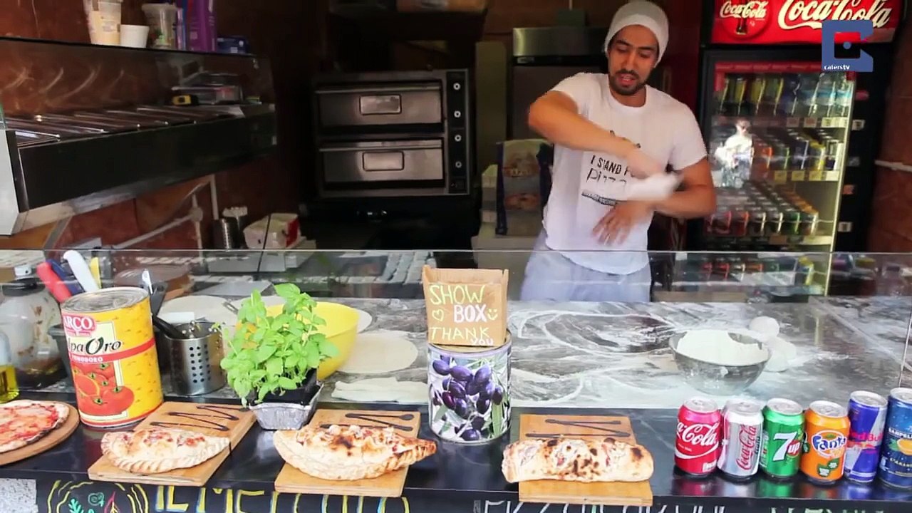 Acrobatic Chef is Pro Pizza Twirler