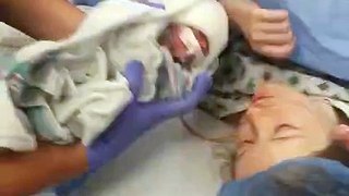 Mother Kisses Baby for First Time After Emergency Operation