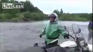 LiveLeak.com - Across the river on a motorcycle.
