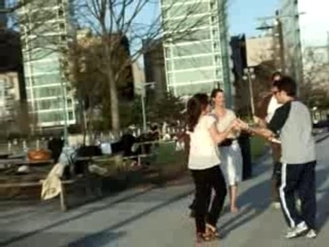 White people dancing salsa on the piers
