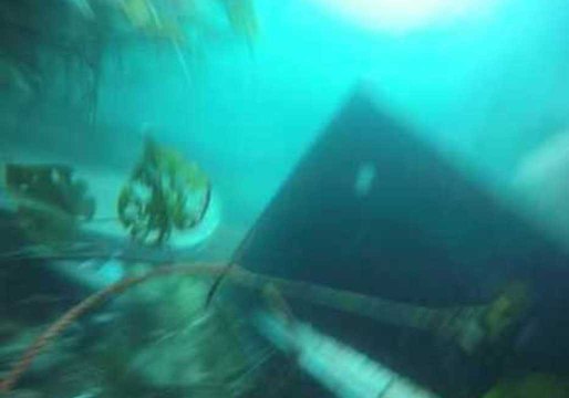 Divers Explore Submerged Vehicles in Queensland Sinkhole