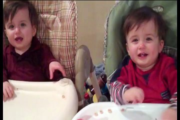 Adorable twins giggle at mom's fake sneeze