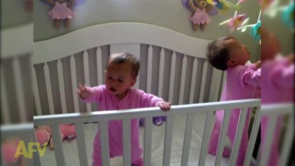 Adorable twins sneeze at the same time