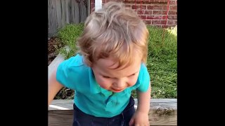 Boy Says Cheese and Falls Over