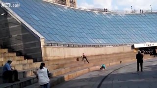 LiveLeak.com - Two idiots slide down a glass roof