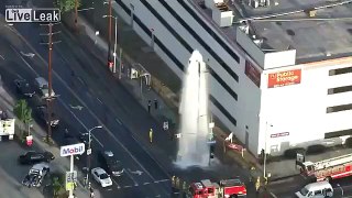 LiveLeak.com - Exploding Fire Hydrant Arcs With Power Line