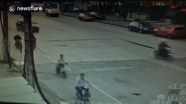 Road collapses as cars drive over it