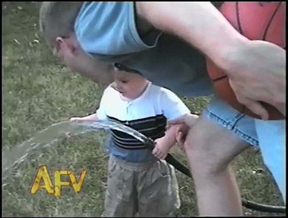 Little child trying to drink water