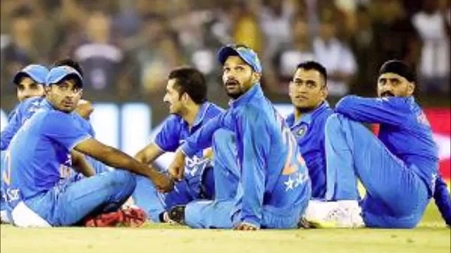 Angry Indian fans throw bottles onto the ground in Cuttack