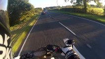 Biker's camera captures high speed near miss
