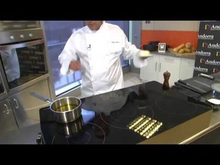 Bacallà confitat amb crema de trumfes, bolets i aire d'herbes.