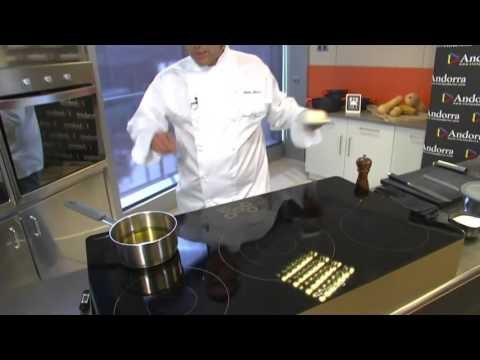 Bacallà confitat amb crema de trumfes, bolets i aire d'herbes.