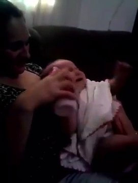 This baby rather drink dad's beer than milk... Hilarious