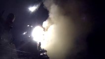 Russian ship launching a volley of missiles against ISIS