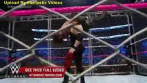 Demon Kane steps inside the cage with a war-torn Seth Rollins - Live from MSG WWE Wrestling On Fantastic Videos