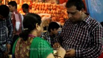 People enjoying street food during Durga puja in Kolkata