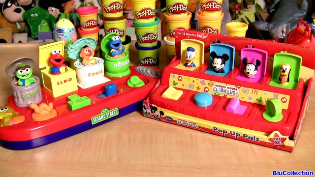 Mickey Mouse Pop Up Surprise Pals Disney Baby Toys vs. Sesame Street Elmo, Oscar, Cookie M