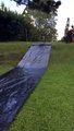 Dog Gets Destroyed In Slow Motion On a Slip n Slide