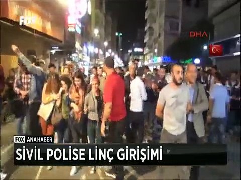 Ankara katliamını protesto gösterilerinde görüntü çeken sivil polise linç girişimi