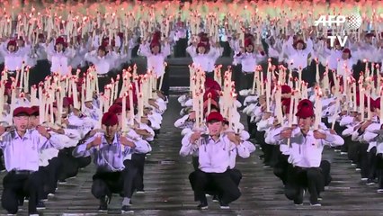 N. Korean students perform torchlit procession for ruling party