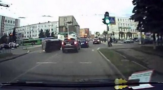With One Small Hip Check, Car Gets Knocked Over Onto Its Side