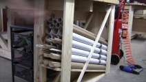 Wooden strips, metal tubing and wire storage