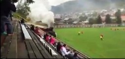 Train running through Slovakian football stadium