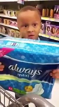 Little boy embarrasses is mother with a pack of Maxi Pads : Use These For Ya Butt