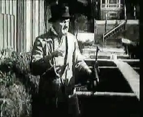 Charlie Chaplin Between Showers