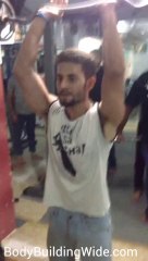 Standing Triceps With Curved Barbell