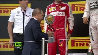 Lewis Hamilton splashes champagne on Putin