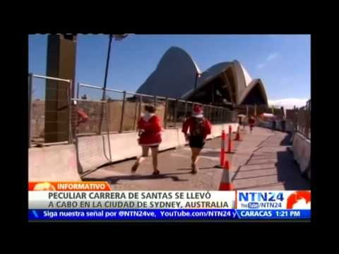 Sídney celebra su tradicional carrera benéfica en la que participan miles de 'Santas'