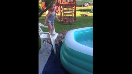 Download Video: Little Girl adorably fails jumping into Inflatable Pool