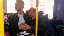 Student Comforts Man With Special Needs on Crowded Bus