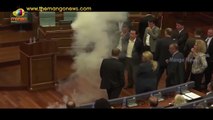 Kosovo Politicians Sets Off SMOKE BOMB In Parliament to Protest Serbia Deal | Mango News