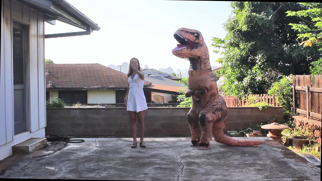 Watching This Girl Teach A T-Rex How To Macarena Is Simply Relaxing