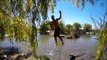 Crazy Tightrope Walker walks on slackline over Alligators Pool