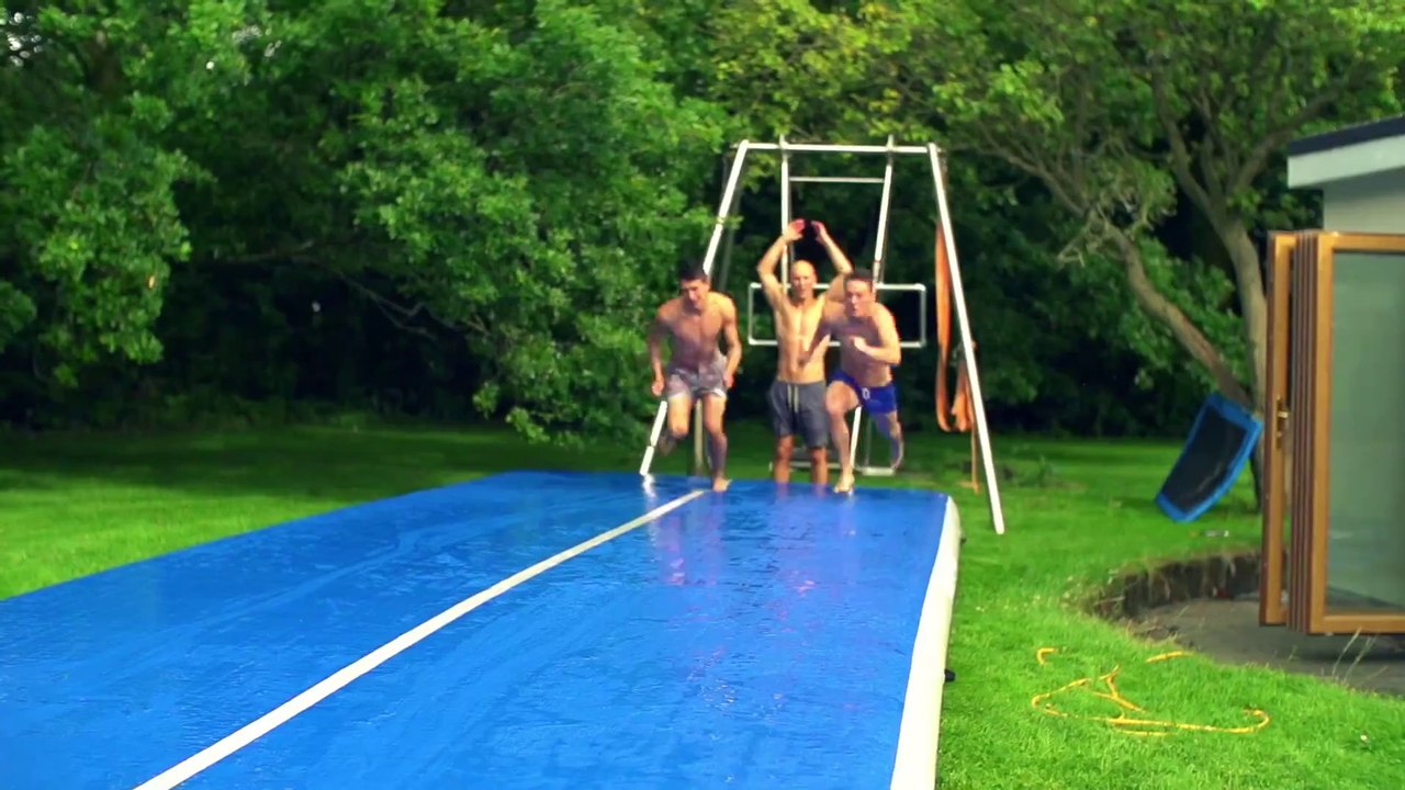 Guys make great slip and slide tricks on air mattress