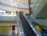 Ha Ha Ha - Indian woman going up wrong way on escalators