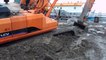 crazy excavator operator, funny excavator videos, excavator stuck in mud