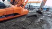 crazy excavator operator, funny excavator videos, excavator stuck in mud