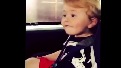 Funny video of little kid dancing in car seat