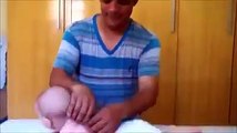 Cute Little Baby Enjoying Daddy's Massage