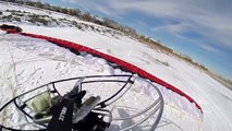 Paramotor Over Snowy Marshes