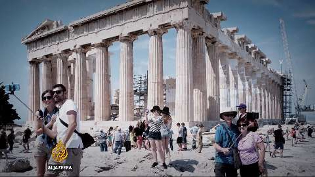 Greece hikes prices at tourist sites to help pay debts