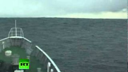 Tsunami Climbing: Incredible video of ship heading into wave in Japan