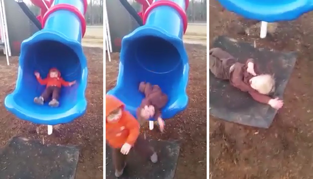 Little Man Gets Twisted Down Slide
