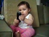 Adorable baby imitating dad on phone! Hilarious