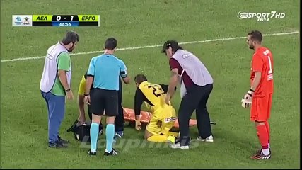 Stretcher-bearer falls over twice, drops injured player